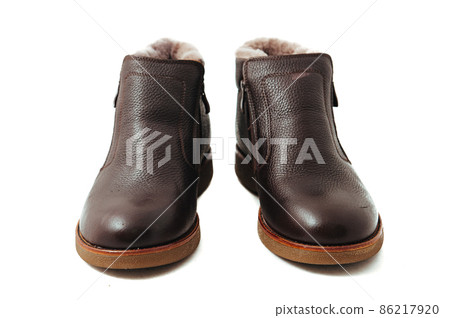 Pair of leather men's shoes isolated on white background 86217920