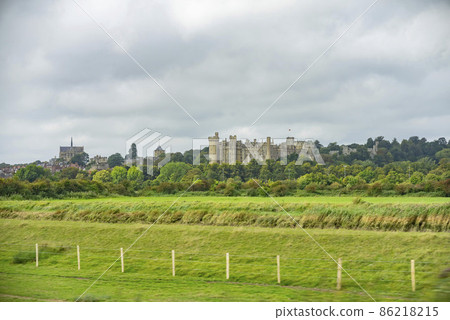 Overcast view of the Arundel Castle and St Philip Howard Church 86218215