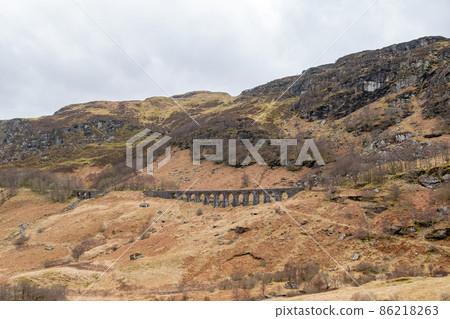 Overcast view of the famous Glenfinnan Viaduct Overcast view of the famous Glenfinnan Viaduct 86218263
