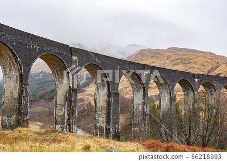 Overcast view of the famous Glenfinnan Viaduct 86218993