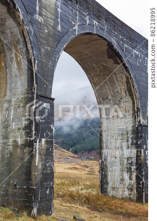 Overcast view of the famous Glenfinnan Viaduct 86218995