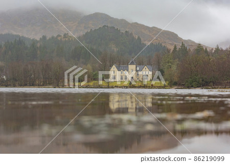 Overcast view of the Glenfinnan House with reflection 86219099