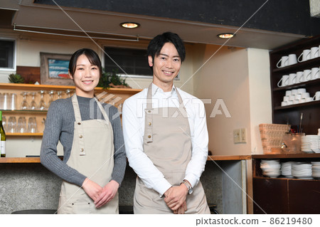 Asian male and female (couple) clerk working at a cafe (restaurant) 86219480