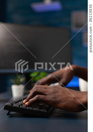 Closeup of developer man hand writing program codes on computer Closeup of developer man hand writing program codes on computer 86219836