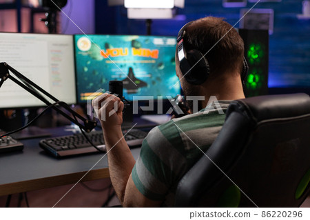 Person celebrating gameplay win with chat on live stream Person celebrating gameplay win with chat on live stream 86220296