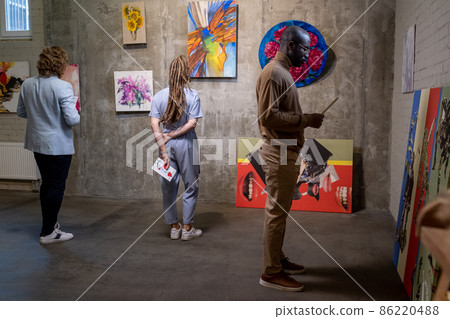 Group of people visiting the art gallery Group of people visiting the art gallery 86220488