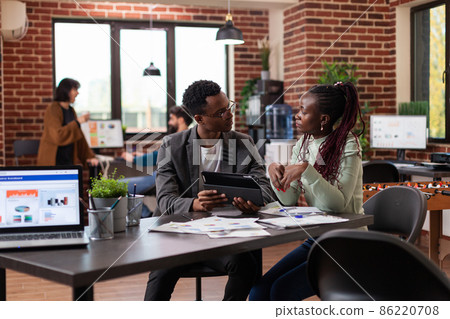 Corporate entrepreneurs analyzing marketing statistics 86220708