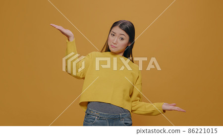 Pensive adult pondering answer and feeling uncertain Pensive adult pondering answer and feeling uncertain 86221015