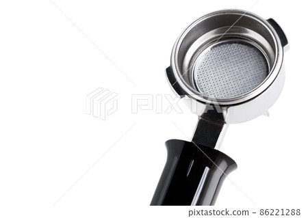 Holder from coffee maker with ground coffee, object isolated on white background with copy space. Holder from coffee maker with ground coffee, object isolated on white background with copy space. 86221288