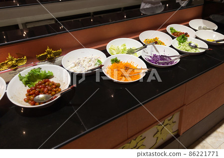 Variety of fresh salads in a buffet 86221771