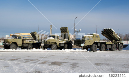 Russian weapons.Soviet Katyusha combat vehicles on a blue sky background. Russian weapons.Soviet Katyusha combat vehicles on a blue sky background. 86223231
