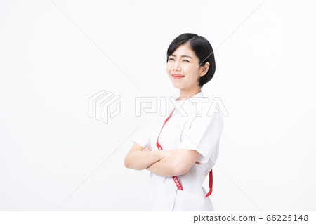 Young nurse in a casey lab coat (white background) Young nurse in a casey lab coat (white background) 86225148