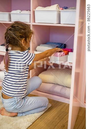 Happy Girl Neatly Roll Folded Underwear and Socks in Plastic