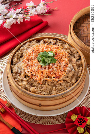 Delicious Chinese glutinous sticky oil rice cake named migao for lunar new year's dishes. 86225893