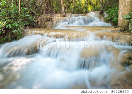 Pu Kang Waterfall in Phan district of Chiang Rai province of Thailand. Beautiful limestone waterfalls in deep jungle of Thailand. Pu Kang Waterfall in Phan district of Chiang Rai province of Thailand. Beautiful limestone waterfalls in deep jungle of Thailand. 86226853