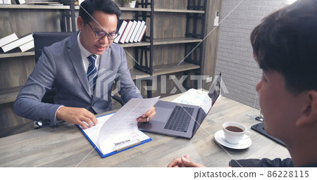Job HR applicants having an interview with Human resource manager jobs interviewing with confident candidate at business firm office give cv resume. Job Interview with headhunter agent and applicant Job HR applicants having an interview with Human resource manager jobs interviewing with confident candidate at business firm office give cv resume. Job Interview with headhunter agent and applicant 86228115