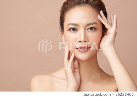 Beautiful young asian woman with clean fresh skin on beige background, Face care, Facial treatment, Beautiful young asian woman with clean fresh skin on beige background, Face care, Facial treatment, 86228406