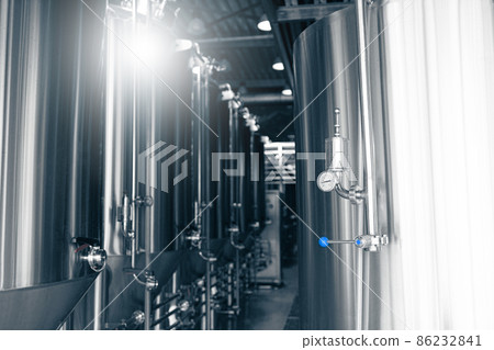 Manometers on steel cylinder storages or vats or tanks on beer and cider production plant, industry machine equipment Manometers on steel cylinder storages or vats or tanks on beer and cider production plant, industry machine equipment 86232841