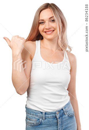 Young woman pointing at your product isolated on white background Young woman pointing at your product isolated on white background 86234188