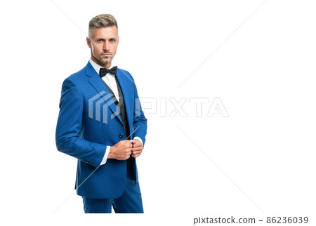 mature man in bow tie blue suit. businessman isolated on white. big boss in formal wear. copy space mature man in bow tie blue suit. businessman isolated on white. big boss in formal wear. copy space 86236039