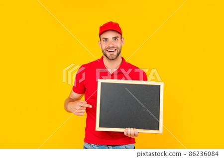 male behind chalkboard. place for useful information. advertisement copy space. 86236084
