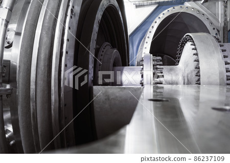 The rotor of a gas turbine compressor with a bolted coupling half Selective focus The rotor of a gas turbine compressor with a bolted coupling half Selective focus 86237109