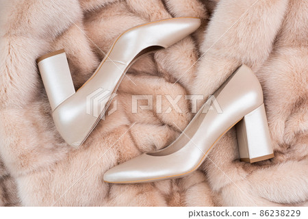 stylish leather shoes on fur background, high heel stylish leather shoes on fur background, high heel 86238229