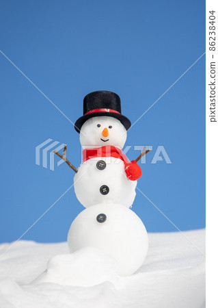 Blue sky and top hat snowman Blue sky and top hat snowman 86238404
