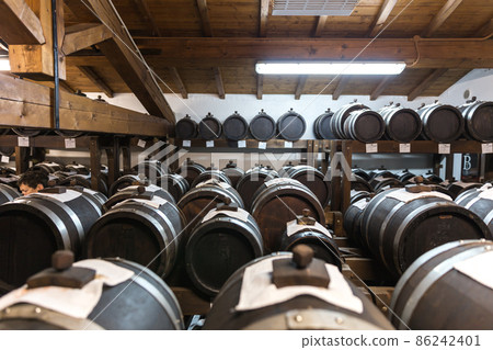 balsamic vinegar wooden barrels storing and aging 86242401