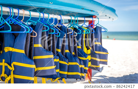 Life jackets and boats on St.Pete beach in Florida, USA. 86242417