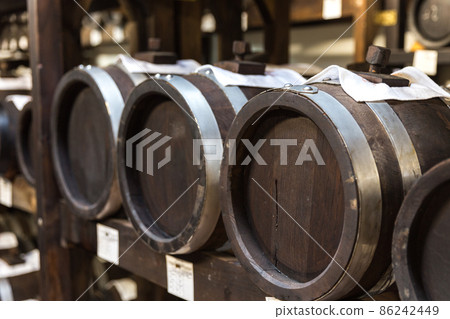 balsamic vinegar wooden barrels storing and aging 86242449