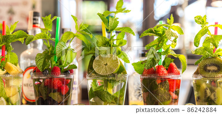 Fruit and berry cocktails in bar in Italy 86242884