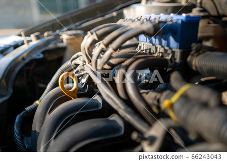 automotive oil level gauge.soft focus.shallow focus effect. automotive oil level gauge.soft focus.shallow focus effect. 86243043