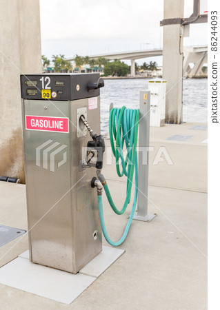 Gas station for ships and boats in the harbor. diesel dispenser. Energy and power concept. Gas station for ships and boats in the harbor. diesel dispenser. Energy and power concept. 86244093