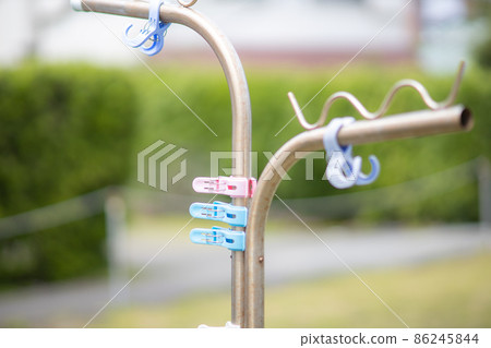 Clothesline and clothespin Clothesline and clothespin 86245844