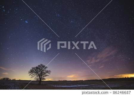Night landscape image with colorful milky way and zodiac light in the horizon Night landscape image with colorful milky way and zodiac light in the horizon 86246687
