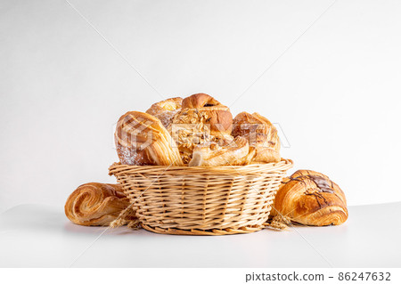 Homemade freshly bakery products with powdered sugar on the top top view and wheat 86247632