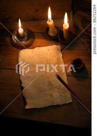 Vintage paper for writing on wooden background Vintage paper for writing on wooden background 86252264