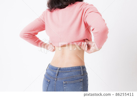 Slim middle-aged woman's waist 86255411