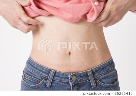 Slim middle-aged woman's waist 86255413