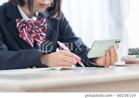 High school image: Hands of high school girls studying High school image: Hands of high school girls studying 86256114