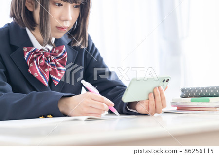 High school image: Hands of high school girls studying High school image: Hands of high school girls studying 86256115