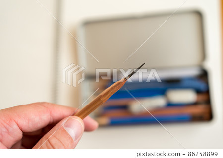 The tip of a pencil used in drawing 86258899