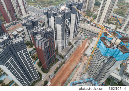 Aerial view of multistory apartment construction site in China 86259544