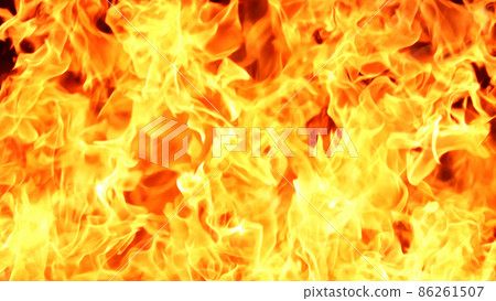 Horizontal background image of a flame burning red Horizontal background image of a flame burning red 86261507