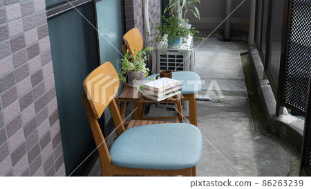 Image of reading on the balcony of the apartment Image of reading on the balcony of the apartment 86263239