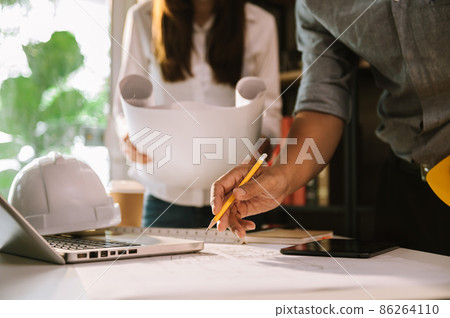 Engineer teamwork. Image of engineer meeting for architectural project. 86264110