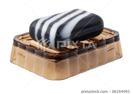 Soap bar on soap dish isolated on white Soap bar on soap dish isolated on white 86264991