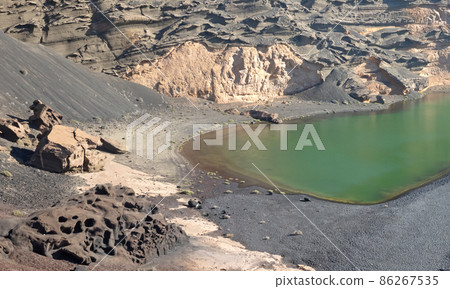 Famous landmark of Lanzarote, green lake Charco de los Clicos 86267535