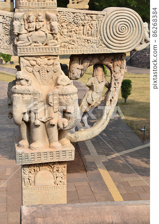 Stupa No 1, North Gateway. Rear view Yaksini from Behind, and elephants on pillar capitals. The Great Stupa, World Heritage Site, Sanchi, Madhya Pradesh, India. Stupa No 1, North Gateway. Rear view Yaksini from Behind, and elephants on pillar capitals. The Great Stupa, World Heritage Site, Sanchi, Madhya Pradesh, India. 86268384
